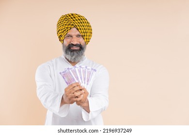 Happy Indian Sikh Farmer With Cash 