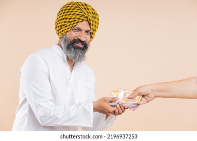 Happy Indian Sikh Farmer With Cash