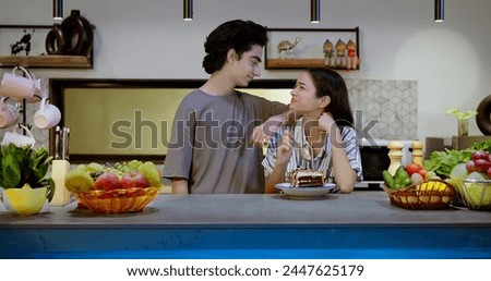 Similar – Image, Stock Photo Young couple having fun in a summer day