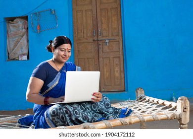 Happy Indian Woman Doing Online Shopping At Home.