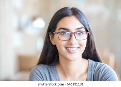 Happy Indian Woman With Pretty Smile In Glasses