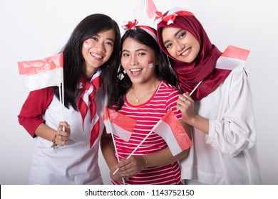 Happy Indonesian Woman With Flag Celebrating Independence Day