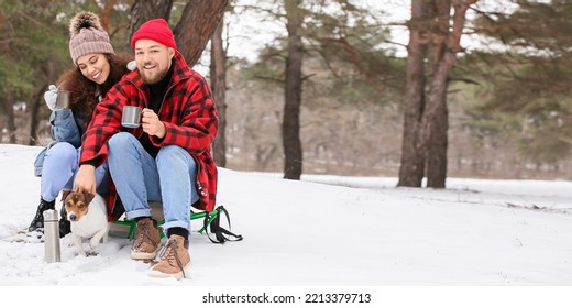 Happy Interracial Couple With Dog In Forest On Winter Day