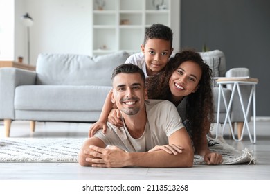 Happy interracial family at home - Shutterstock ID 2113513268