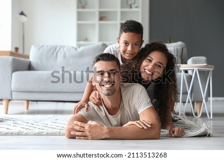 Happy interracial family at home