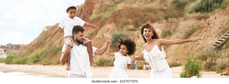 Happy Interracial Family On Sea Beach. Banner For Design