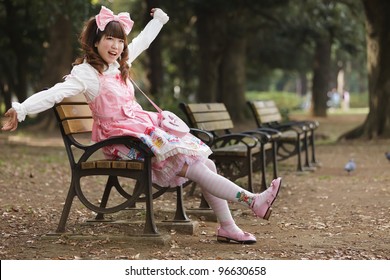 Happy Japanese Girl In Fashion, Harajuku Park, Tokyo