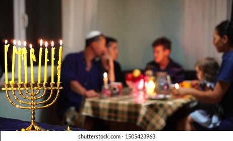 Happy Jewish Family Celebrates Hanukkah. Festival Of Lights. Israel People. The Hanukkah Menorah