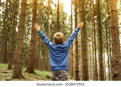 Happy joyful carefree child out in nature forest feeling free  - Powered by Shutterstock