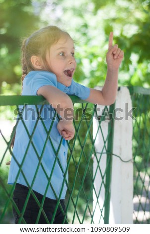 Similar – Happy little girl playing in a urban playground.