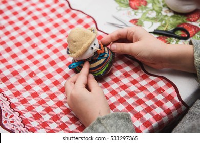 Happy Kid Doing Craft. Small Child Holding A Felt Christmas Snowman In Hands. Workplace In Kindergarten, School Or Home. Kids Christmas Crafts Idea. Children Winter Creativity