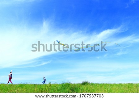 Similar – Flying rainbow kites coast