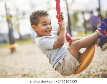 A Happy kid on playground on summer season - Powered by Shutterstock