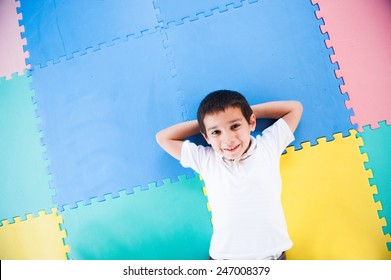 Happy kid playing in playground
