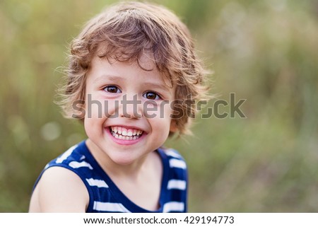 Similar – Small child with long blond hair