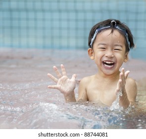 happy kid in the water