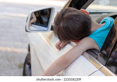 Happy Kid In White Car Looking In Rear View Retractable Lateral Mirror Through Lateral Door Window.joyful Child Boy Ready Fir Trip Travel By Car.family Adventure Smiling Kid Hands Up Expressing Hooray