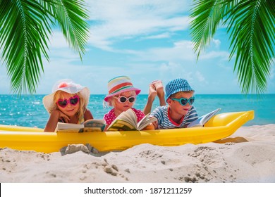 Happy Kids- Boy And Girls Read Books On Beach, Family Vacation