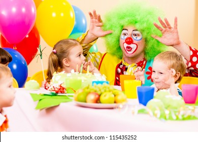 Happy Kids With Clown On Birthday Party