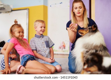 Happy Kids With Dog During Therapy