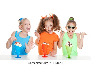 Happy Kids Eating Ice Cream At Birthday Party