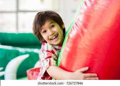 Happy kids at indoor playground