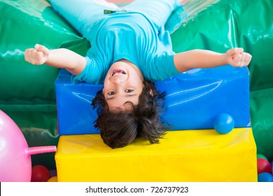 Happy Kids At Indoor Playground