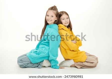 Similar – Image, Stock Photo Preteen girl in hoodie standing near green trees