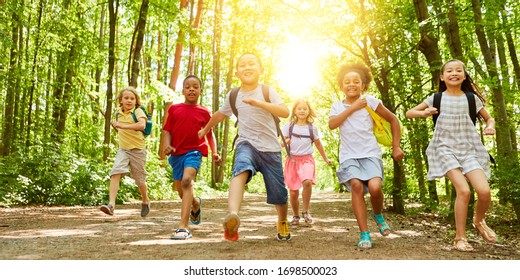 Happy Kids Run Together To Summer Camp In Nature