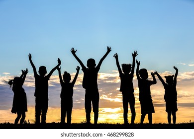 Happy Kids Silhouettes On Sunset Background Stock Photo 468299828 ...