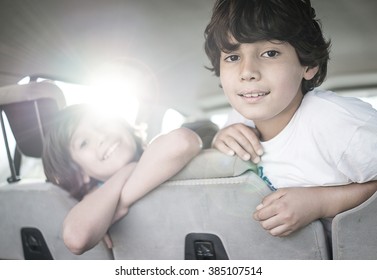 Happy Kids Travel By The Car