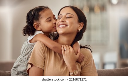 Happy, kiss and hug on mothers day in living room sofa, love and relaxing together in Australia family home. Young girl, smile parent and happiness, quality time and care on lounge couch for fun - Powered by Shutterstock