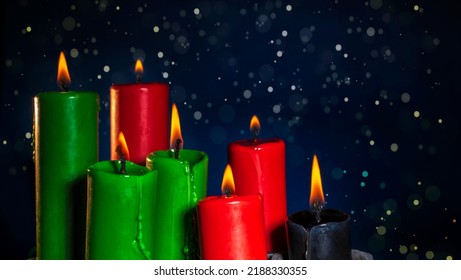 Happy Kwanzaa holiday background. African American culture festival.  Colorful bright background for greeting card, invitation, wrapping paper  with text Happy Kwanzaa and candles. Stock Illustration