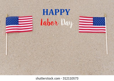 Happy Labor Day Background With Flags On The Sandy Beach - USA Holidays Concept