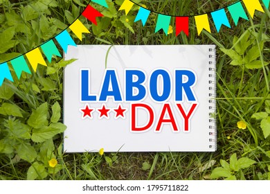 Happy Labor Day Banner Or Card With Green Lawn, Album And Flags