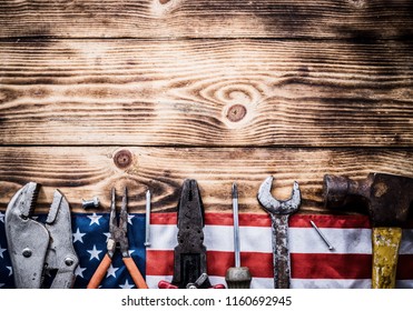 Happy Labor Day. Construction Tools. Copy Space For Text On Wood Background.