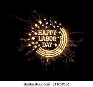Happy Labor Day greeting done using sparklers on black background with copy space. - Shutterstock ID 211050151