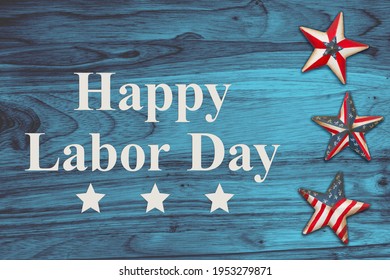Happy Labor Day message with USA flag stars on grunge blue wood  - Shutterstock ID 1953279871