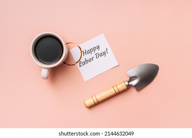 Happy labor day sticker with mug print next to small spatula. - Powered by Shutterstock