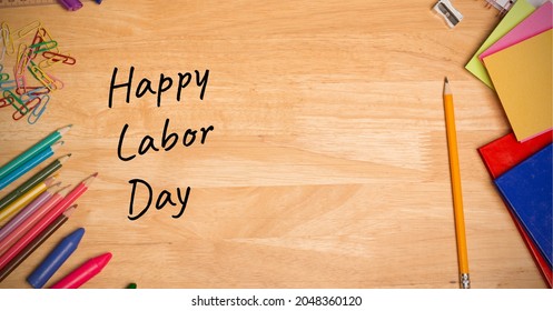 Happy Labor Day Text Over Multiple School Equipment On Wooden Table. Labor Day Celebration Concept