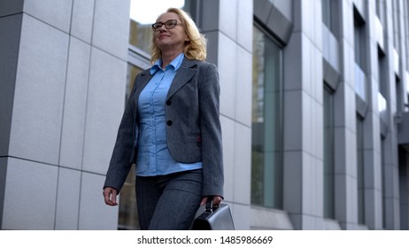 Happy Lady Boss In Suit Walking Office Building, Satisfied Company Manager