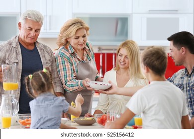 Happy Large Family On Kitchen