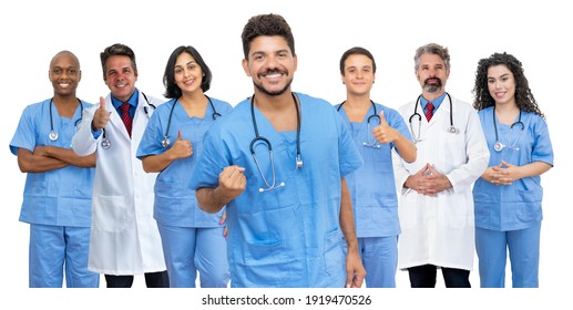 Happy Latin American Male Doctor With Motivated Medical Team Isolated On White Background For Cut Out