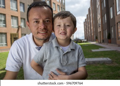 Happy Latin American Man And Boy, Father And Son.
