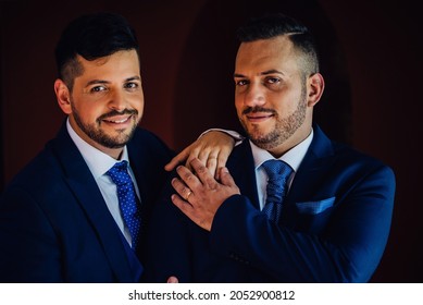 Happy Latin Gay Couple In Blue Suit On Their Wedding Day Posing For Photo Shoot, Concept Portrait At Gay Wedding