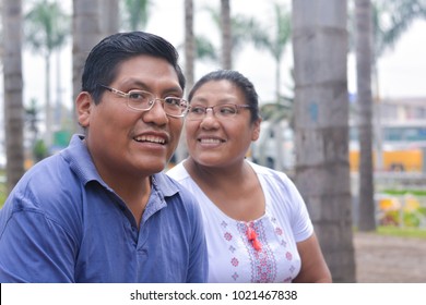 Happy Latin People Wearing Glasses In The Summer Park.