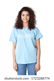 Happy Latin Teen Girl, Young Hispanic Woman Activist Wear Volunteer Tshirt Looking At Camera Standing Isolated On White Background. Charity Help, Donate, Volunteer Worker Concept. Vertical Portrait