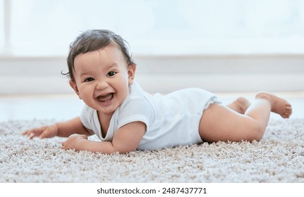 Happy, laugh and portrait of baby on floor in home for child development, wellness and growth. Family, childhood and young infant in living room for learning to crawl, playing and relax in house - Powered by Shutterstock