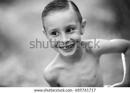 Similar – Cute little boy toaching the water with his feet.