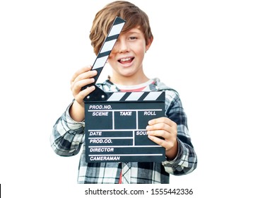 Happy Laughing Boy Holding Clapper Board. Happy Teenager Wants To Be A Movie Star. Cinema Concept With Clapperboard. Isolated